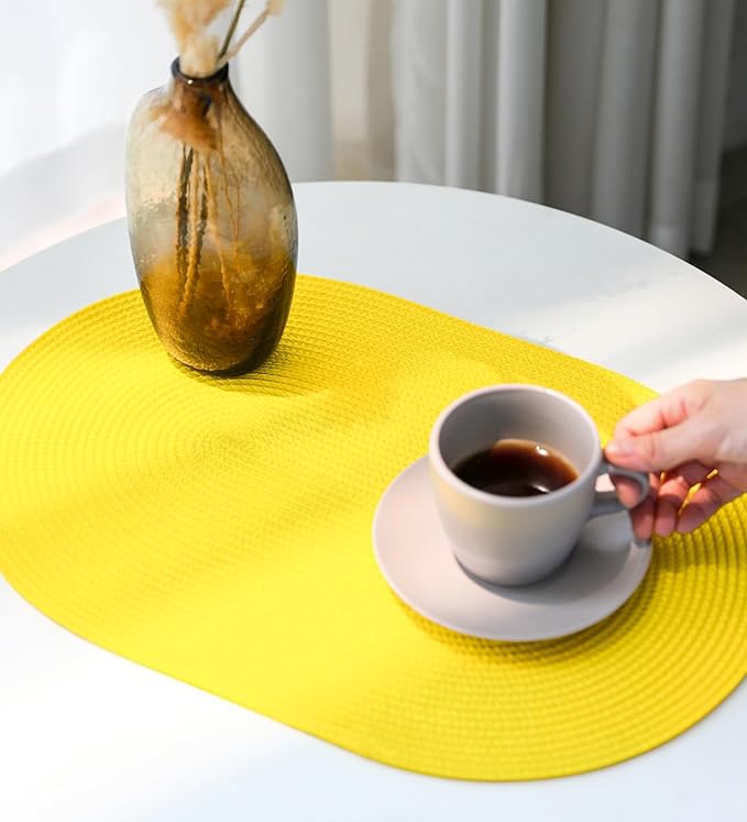 FunWheat Oval Braided Placemats Set of 4 Table Mats for Dining Tables Washable Heat Resistant Place Mats for Indoor Outdoor Use 12 x18 Inch (Oval Yellow, 4pcs)