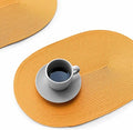 FunWheat Oval Braided Placemats Set of 6 Table Mats for Dining Tables Washable Heat Resistant Place Mats for Indoor Outdoor Use 12 x18 Inch(Oval Pumpkin, 6pcs)