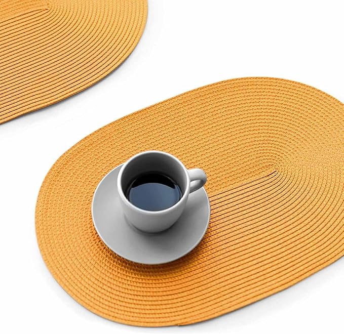 FunWheat Oval Braided Placemats Set of 4 Table Mats for Dining Tables Washable Heat Resistant Place Mats for Indoor Outdoor Use 12 x18 Inch(Oval Pumpkin Yellow, 4pcs)